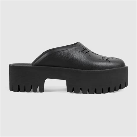 Women's platform perforated G sandal in black rubber 